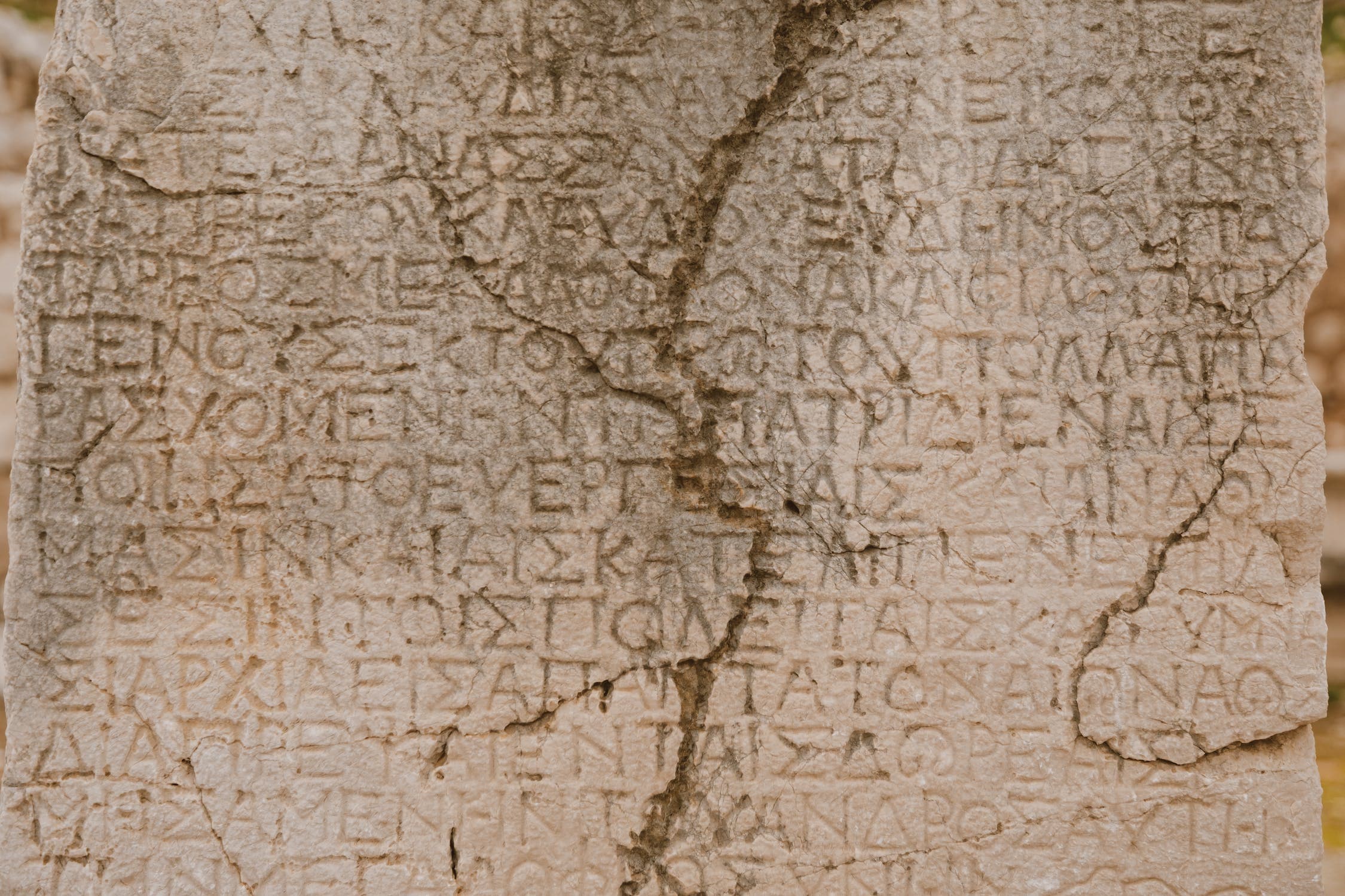 An ancient stone tablet with a Greek inscription