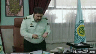A man counting on his fingers by touching the finger to the thumb, starting with the pinky