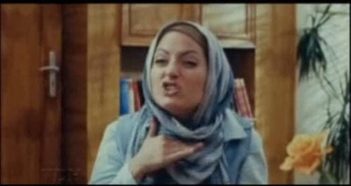 Woman putting her hand under her chin to express that she's fed up