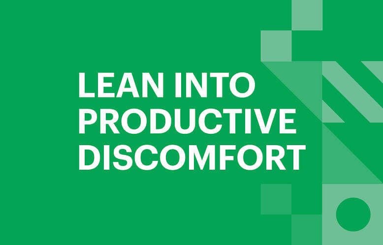 Writing that says: "lean into productive discomfort"