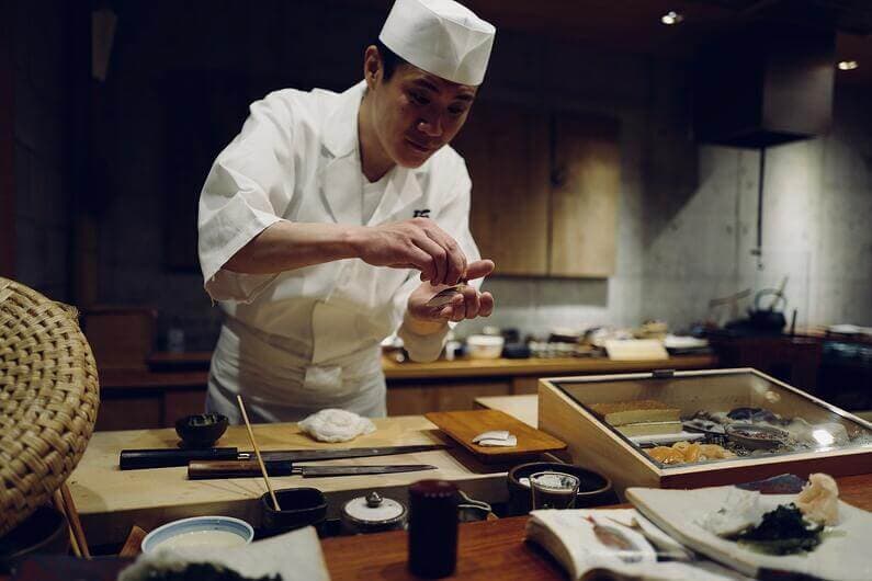A chef preparing a Sushi dinner