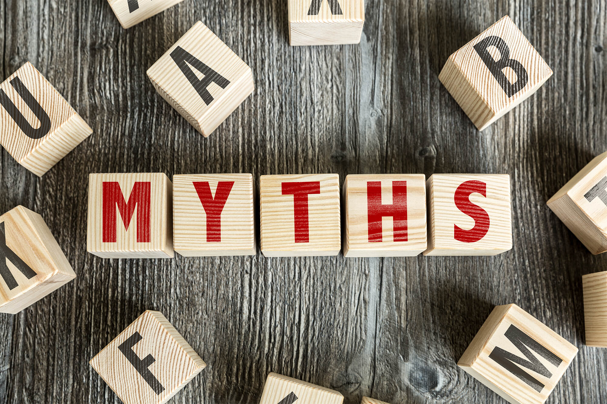 Scrabble tiles spelling the word: "Myth"