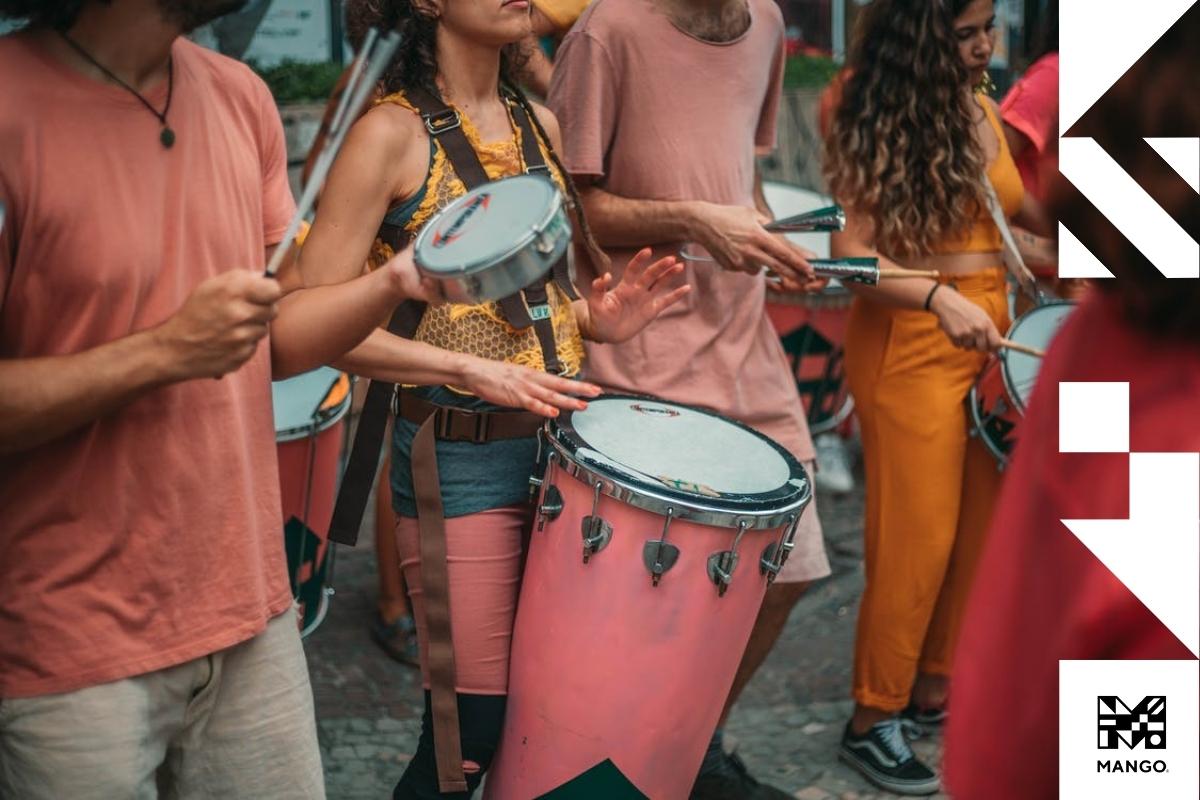 A group of people playing percussions